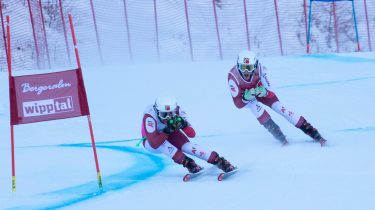 Kategorie „Sehbehindert“ mit Guide beim Para-Ski-Rennen auf der Bergeralm in Steinach am Brenner.